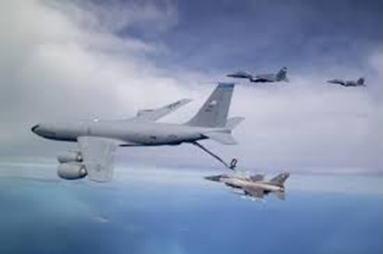 military aircraft flying in formation